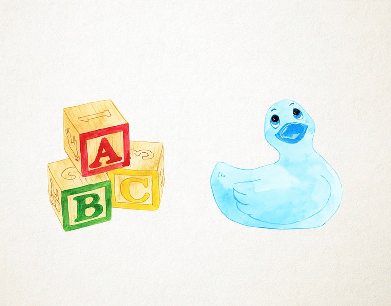 May include: A stack of three wooden blocks with the letters A, B, and C painted on them. The blocks are in red, green, and yellow. A blue rubber duck is to the right of the blocks.
