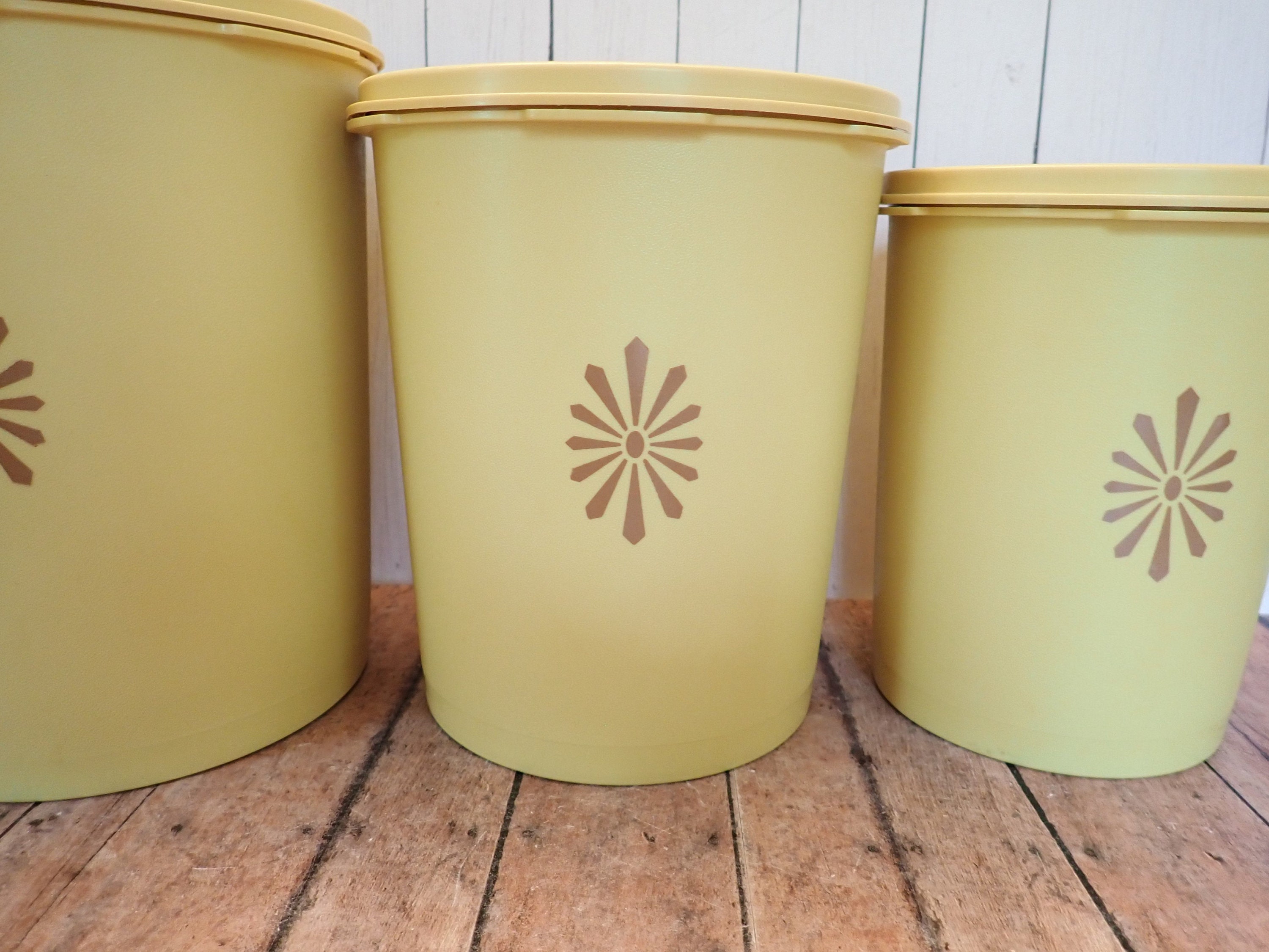 Set of 4 Tupperware Daffodil Yellow Servalier Canisters with Sunburst Lids