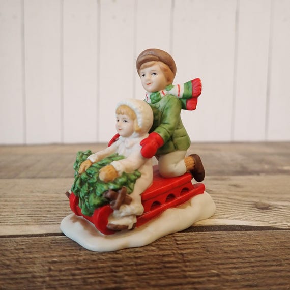 Vintage LEFTON Colonial Village Accessory Michael and Missy on Sled with Tree Village People Accessories 07826