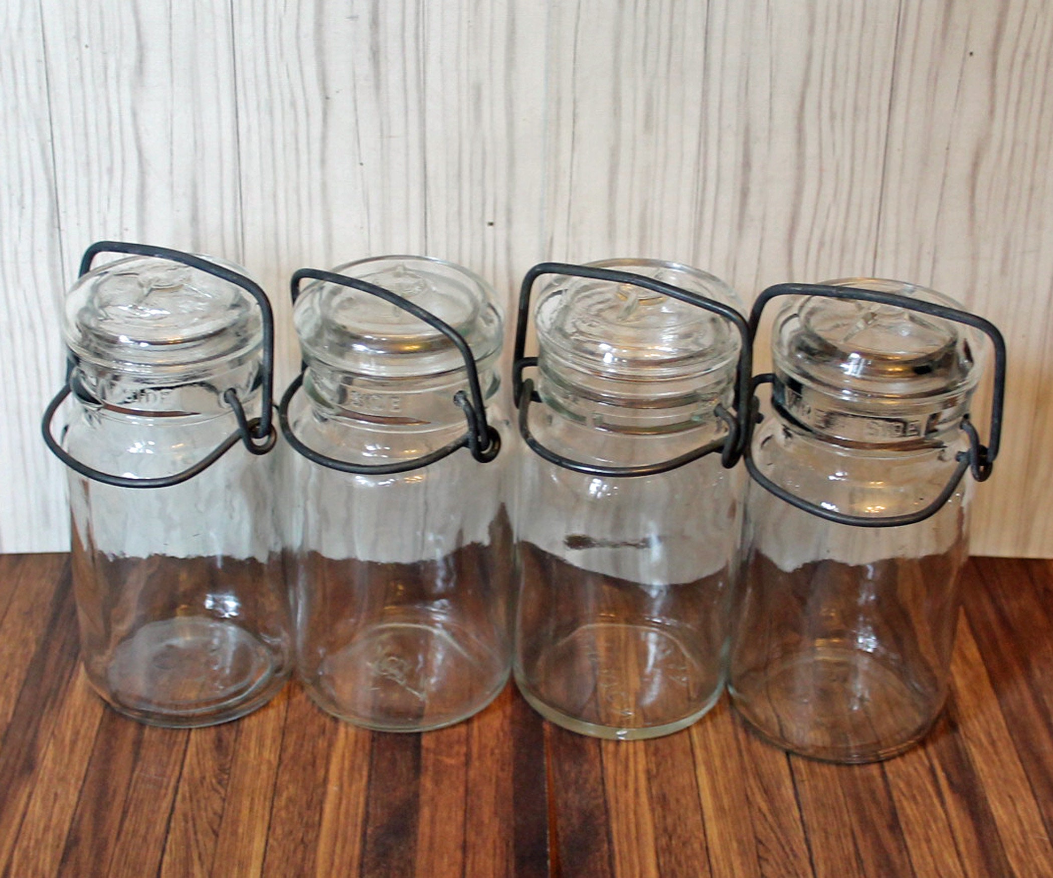 Vintage Set of 8 Clear Glass Canning Bottles with Bail and Lid Wooden