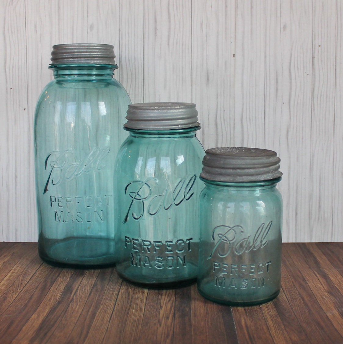 Vintage Blue Glass Ball Mason Jar Set Of 3 With Tin Lids No Line Logo fido-jars-with-clamp-lids-crate-and-barrel-in-2021-food-storage