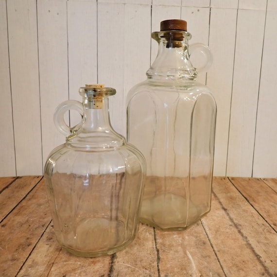Vintage Quart and Pint Clear Glass Whiskey Bottle Set of 2 Round Jug Style Bottles with Ring Handle Old Quaker