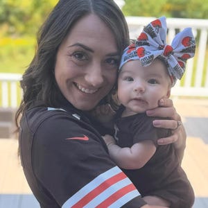 Custom made big bows and head wraps in your favorite team!