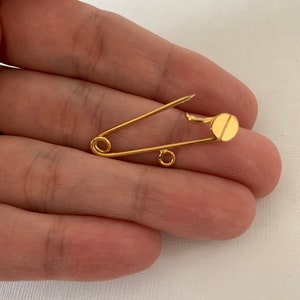 24k Gold plated baby safety pin. Baby safety pin no charms.