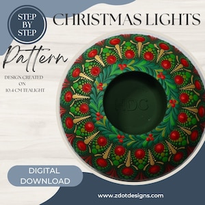 May include: A green, red, and gold Christmas lights mandala dot painting pattern for a 10.4 inch tealight holder. The design features a wreath with holly berries and leaves. The pattern is labeled "Christmas Lights" and "Pattern".