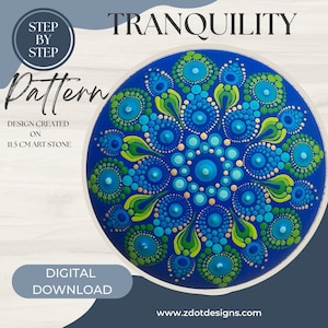 May include: A step-by-step dot painting pattern for a mandala design on a 11.5 inch art stone. The mandala features blue, green, and gold dots arranged in a circular pattern. The design is called "Tranquility".