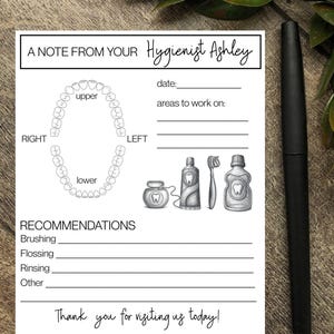 May include: A white dental hygiene note pad featuring the text A NOTE FROM YOUR Hygienist Ashley, a diagram of upper and lower teeth labeled RIGHT and LEFT, sections for date, areas to work on, recommendations for brushing, flossing, rinsing, and other.
