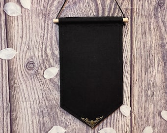 Zwarte canvas spandoek met metalen hoek