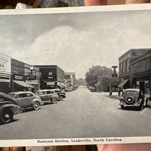 Belle carte postale ancienne RPPC Real Photo de la section des affaires, Leaksville, Caroline du Nord