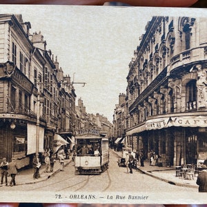 Beautiful 1930s Antique Unused Postcard of La Rue Bannier in d’Orleans, France with Trolley