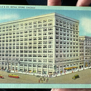 Belle carte postale colorisée antique de Marshall Field & Co., magasin de détail à Chicago, Illinois