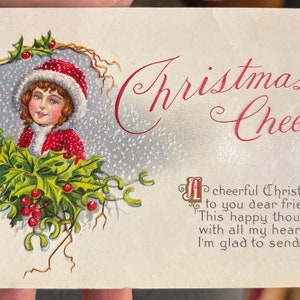 Doce antigo em relevo de alegria de Natal com cartão postal de menina 1918