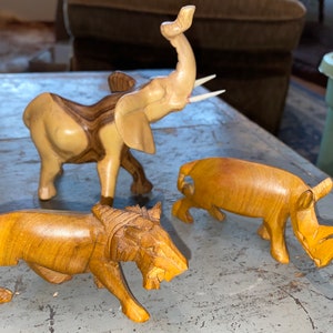 Three Beautiful Vintage African Handcarved Wooden Lion Elephant and Rhinoceros