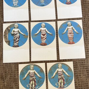 8 cartes postales vintage inutilisées d’Un Putto