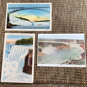 Bellissime cartoline di lino antiche del Rainbow Bridge, cascate americane dalle cascate dell'isola di capra del Niagara Negli Stati Uniti e in Canada