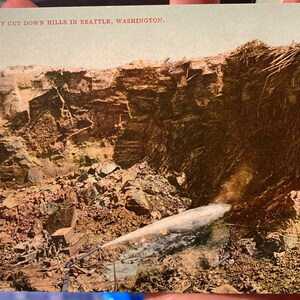 Belle carte postale colorisée antique de « How They Cut Down Hills à Seattle, Washington »