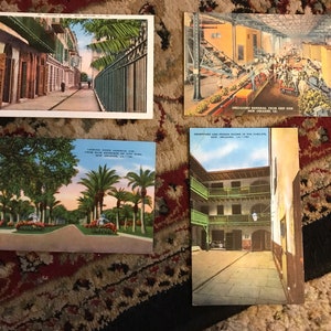 4 Magníficos Postais Antigos de Linho da Louisiana: St Anthony’s Alley, City Park, The Cabildo, Descarregando Bananas