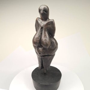 Venus of Willendorf and Venus of Dolni Vestonice,  Gott beauty and  birth female symbol