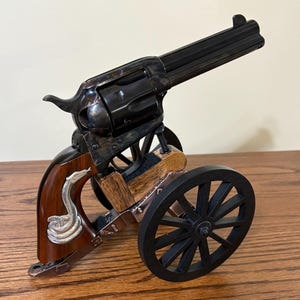 Cowboy Action 6 Shot Revolver Hand Cannon Display Stand With 4.5” Diameter Wood Wheels