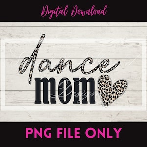 May include: Digital download of a graphic design featuring the text "dance mom" in black with a leopard print heart. The text and heart are on a white wood background.