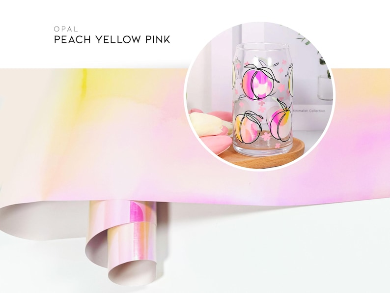 May include: A glass with a peach, yellow, and pink ombre design. The glass has a peach design with black outlines and pink flowers. The text "OPAL PEACH YELLOW PINK" is at the top of the image.