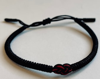 CONFIDENCE Infinity Knot Bracelet