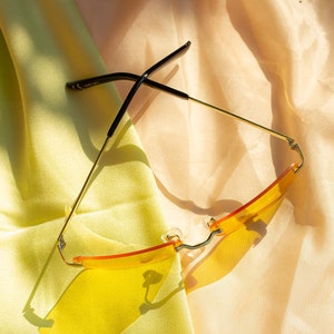 Orange Rimless Rectangle Tint Sunglasses