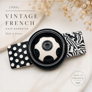 Pinza para el cabello francesa vintage de los años 80, color blanco y negro, con estampado llamativo. Hecha en Francia. Accesorio para el cabello de acrílico con diseño gráfico atrevido.