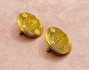 Vintage guldfärgade art déco Fleur de Lis klämmörhängen i statement-stil runda medaljonger retro smycken