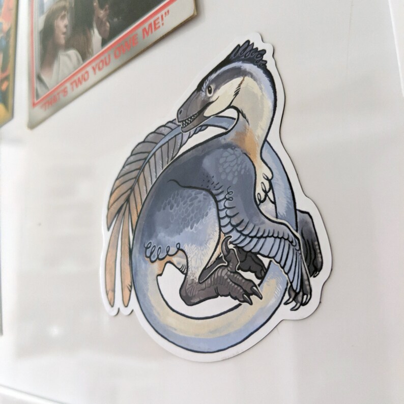 blue feathered raptor