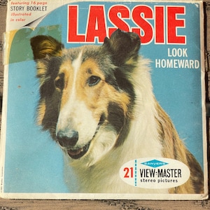 May include: Vintage "Lassie" View-Master booklet cover featuring a color illustration of a Collie dog. The title "Lassie" is in large red letters, with "Look Homeward" below. Includes "21 View-Master stereo pictures".