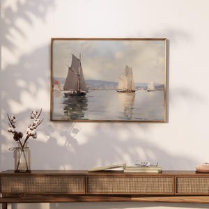 a painting hanging on a wall above a table