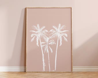 May include: A rectangular framed wall art piece featuring a dusty rose background with a white line drawing of three palm trees. The artwork is encased in a thin, light-colored wooden frame, showcasing a simple botanical illustration.