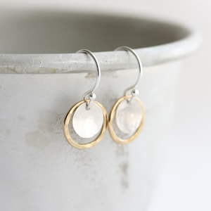 small drop earrings 10mm hammered 14k gold filled rings surrounding 7mm hammered sterling silver discs on sterling silver earwires