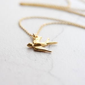 Gold swallow necklace, tiny bird pendant, dainty gold necklace