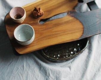 Wabi-sabi acacia tea table. Handmade chaban made of wood for a tea ceremony.