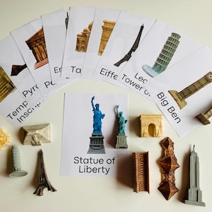 May include: A set of miniature replicas of famous landmarks around the world, including the Eiffel Tower, the Statue of Liberty, Big Ben, and the Leaning Tower of Pisa. The miniatures are made of plastic and are painted in realistic colours. Each miniature is accompanied by a card with the name of the landmark printed on it.