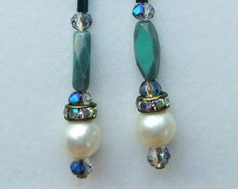 9. Long, dangle pearl earrings
