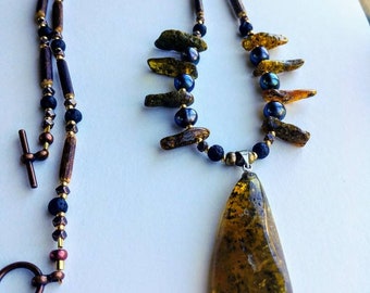 37. Medium length healing Baltic amber,black pearls, tube wood and black lava beaded, pendant neclace
