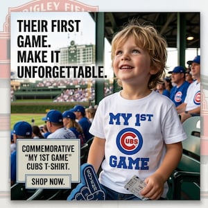 May include: A young child wearing a white t-shirt with "MY 1ST GAME" and a Chicago Cubs logo. The image includes text that reads "Their first game. Make it unforgettable." and "Commemorative 'My 1st Game' Cubs T-shirt."