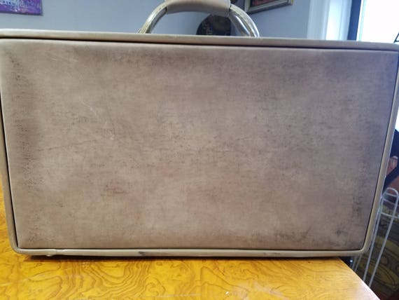 small vintage leather suitcase