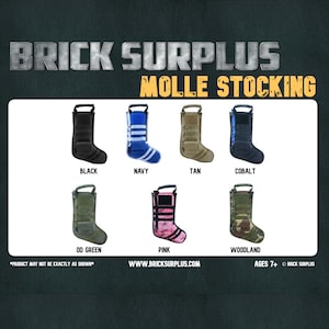 May include: A set of 7 different coloured MOLLE stocking designs. The stockings are made of a durable fabric and feature a variety of colours, including black, navy, tan, cobalt, OD green, pink, and woodland. The stockings are perfect for adding a touch of military style to your holiday decor.  Ages 7+ BRICK SURPLUS