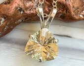 10X10X10mm 2.95ct trillion, champagne colored Oregon Sunstone pendant