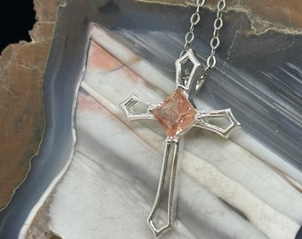 5.5X5.5mm .75ct princess cut peach color with schiller Oregon Sunstone silver cross pendant