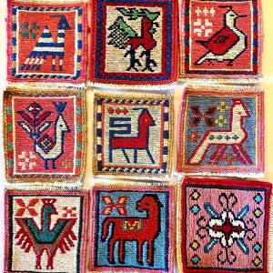 May include: Nine square, hand-stitched textile coasters with bird and horse designs. Each coaster has a red border and a central image in red, blue, and white. The coasters are arranged in a 3x3 grid.