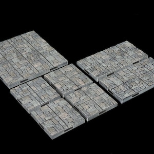 Puede incluir: Seis piezas de baldosas de piedra gris para un juego de mesa o un terreno de juego de guerra en miniatura. Las baldosas están hechas de plástico texturizado y tienen un aspecto de piedra realista.