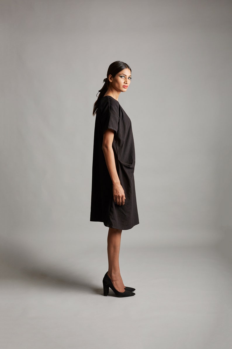 Black organic cotton dress with side pockets Handcrafted black cotton pleated dress Little black dress with minimal embroidery