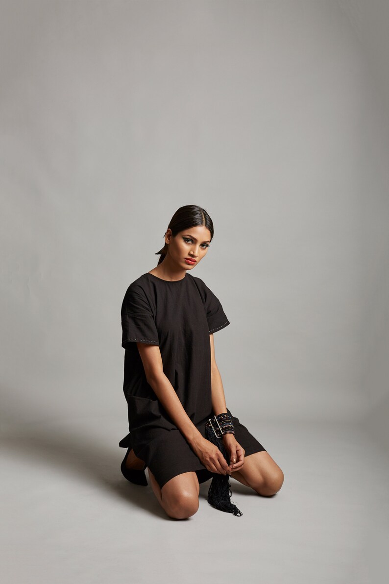 Black organic cotton dress with side pockets Handcrafted black cotton pleated dress Little black dress with minimal embroidery