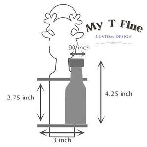 May include: A gray metal bottle holder shaped like a reindeer with a bottle inside. The holder is 4.25 inches tall, 3 inches wide, and 2.75 inches deep. The bottle is 0.90 inches wide.
