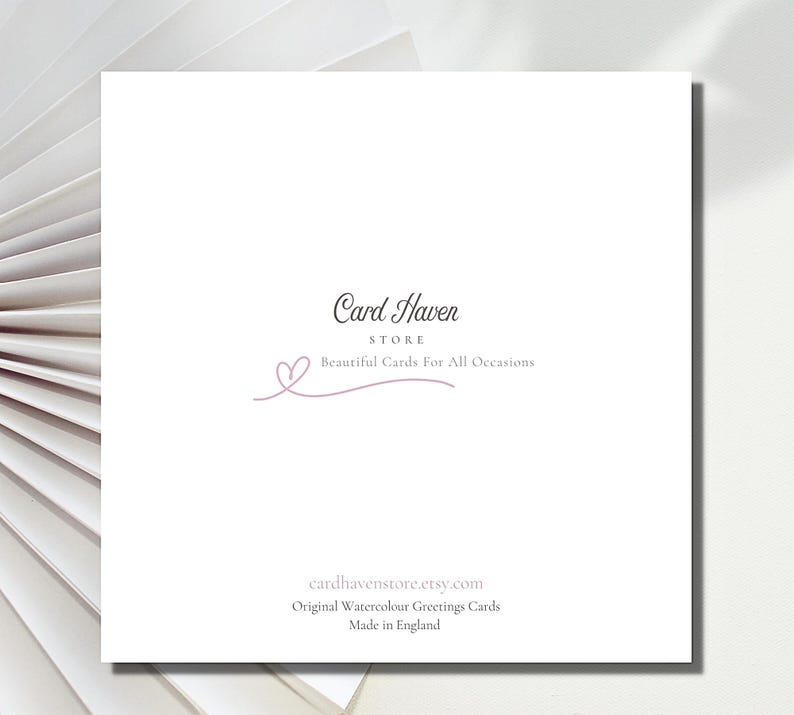 May include: A white greeting card featuring the text "Card Haven STORE Beautiful Cards For All Occasions" in a graceful script. The card also displays the website cardhavenstore.etsy.com and the text "Original Watercolour Greetings Cards Made in England."